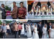 11 Pasang Pengantin Ikuti Pernikahan Massal di Pangolombian, Wali Kota Tomohon Serahkan Dokumen Kependudukan